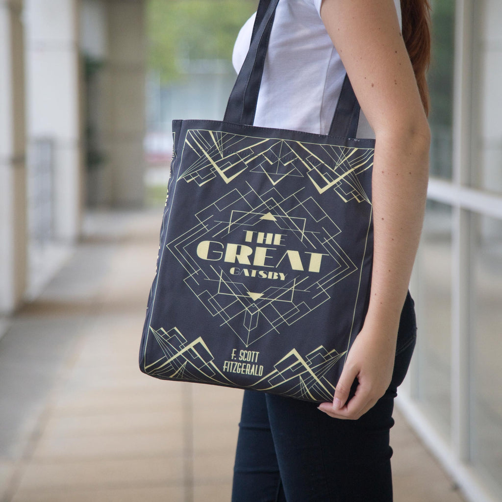 The Great Gatsby Black Tote Bag by F. Scott Fitzgerald featuring Art-Deco Lattice design, by Well Read Co. - perfect for carrying your daily necessities.@ Model Standing