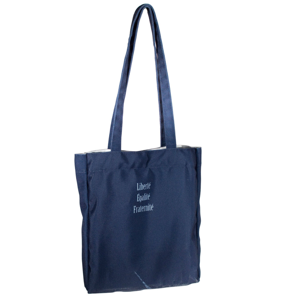 Les Misérables Navy Tote Bag by Victor Hugo featuring Cosette over French flag design, by Well Read Co. - Back