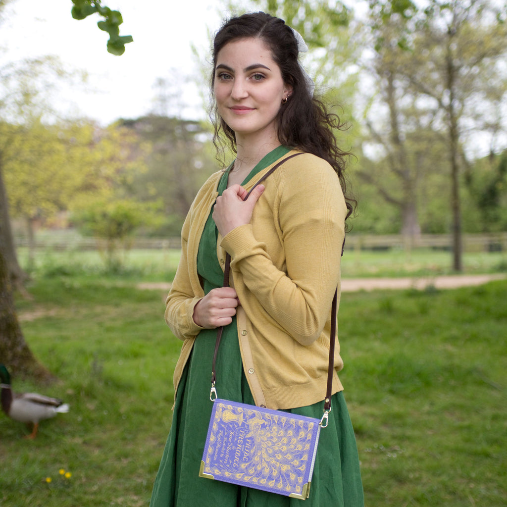Pride and Prejudice Purple Book Bag by Jane Austen featuring Peacock design, by Well Read Co. - Model with bag