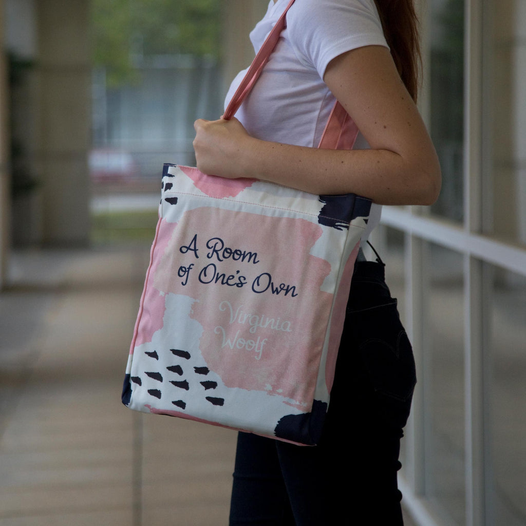 A Room of One's Own Pink and Blue Tote Bag by Virginia Woolf featuring Paint Splotches design, by Well Read Co. - Girl with Bag