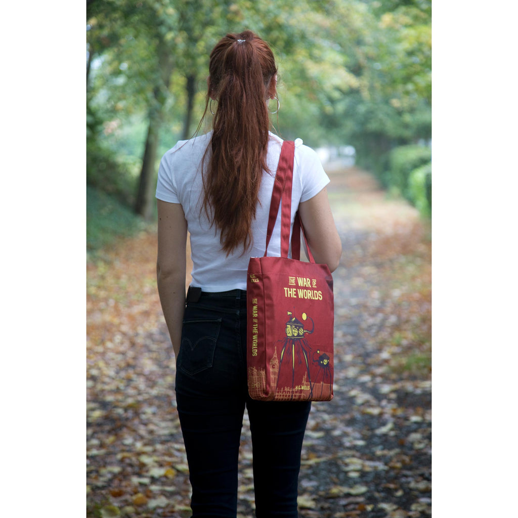 The War of the Worlds Red Tote Bag by H.G. Wells featuring Alien Tripods design, by Well Read Co. - Model Back Side