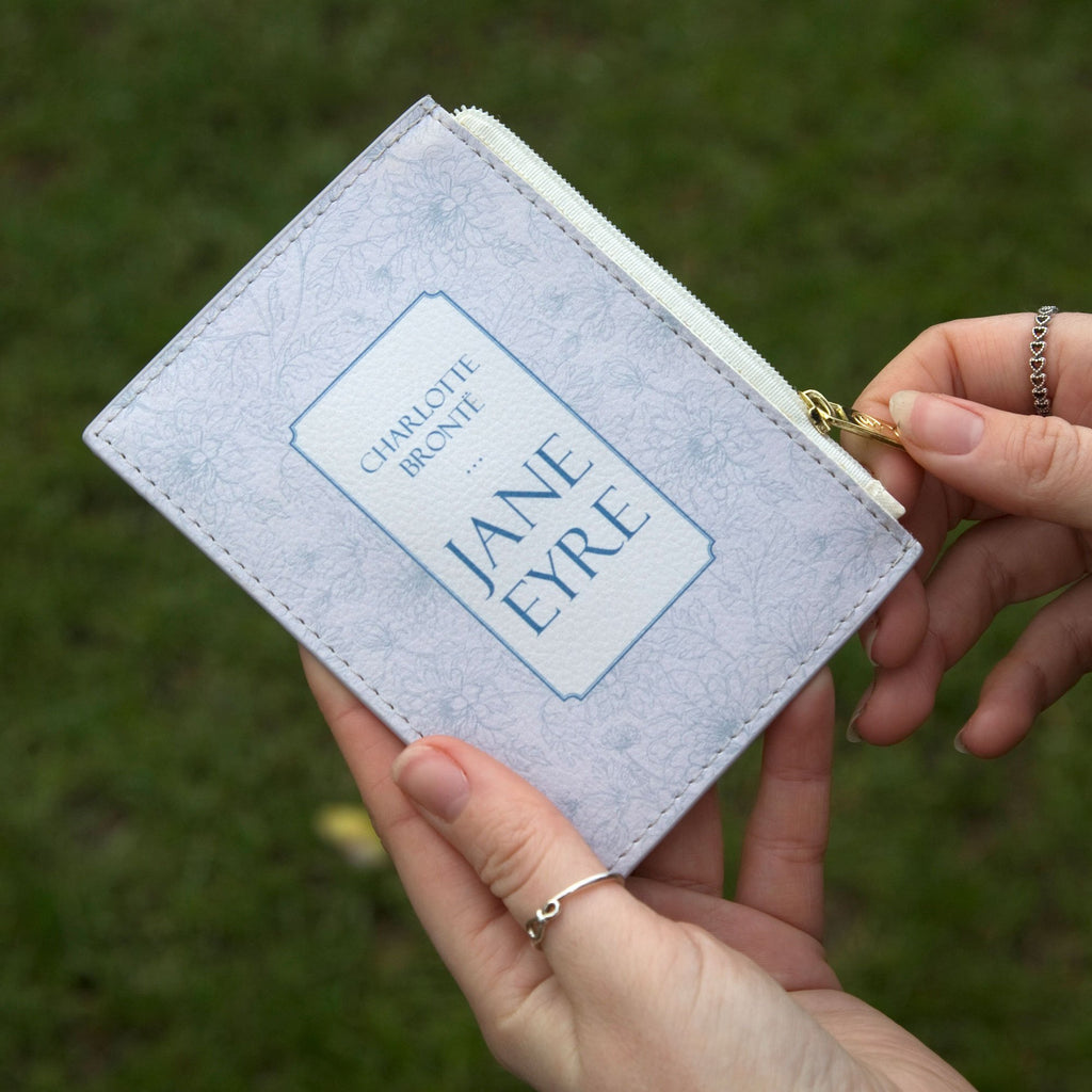 Jane Eyre Lilac Coin Purse by Charlotte Brontȅ featuring Floral design, by Well Read Co. - Hands